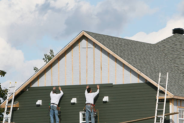 Professional Siding technician working in Angier, NC